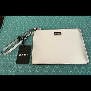 Brand New & Never Worn! Fabulous DKNY silver wristlet.